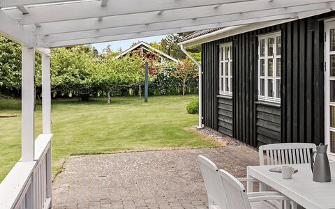 Skrolan - 200M from the Sea: Garden, Shade, Porch, Patio, Outdoor Structure, Outdoor Furniture, Yard, Deck, Backyard, Awning