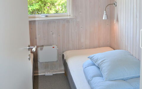 Kustaa - 1Km from the Sea: Wall, Bedroom, Bed, Flooring, Wood, Floor, Interior Design, Bed Sheet, Bedding, Furniture