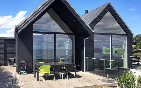 Reinhard - 50M from the Sea: Furniture, Interior Design, Flooring, Wood, Floor, Ceiling, Wood Flooring, Chair, Table, Lighting