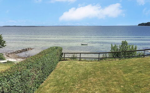 Reinhard - 50M from the Sea: Furniture, Interior Design, Flooring, Wood, Floor, Ceiling, Wood Flooring, Chair, Table, Lighting