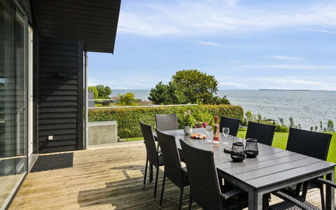Reinhard - 50M from the Sea: Furniture, Interior Design, Flooring, Wood, Floor, Ceiling, Wood Flooring, Chair, Table, Lighting