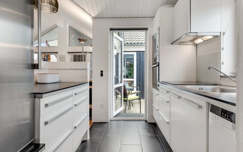 Athisl - 800M from the Sea: Kitchen, Countertop, Interior Design, Flooring, Major Appliance, Kitchen Appliance, Cabinetry, Ceiling, Home, Floor