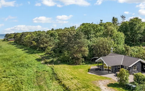 Thorman - 75M from the Sea: Roof, House, Home, Cottage, Siding, Estate, Driveway, Garden Buildings, Yard, Shed