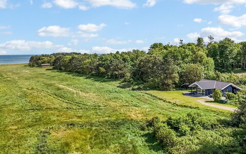 Thorman - 75M from the Sea: Roof, House, Home, Cottage, Siding, Estate, Driveway, Garden Buildings, Yard, Shed