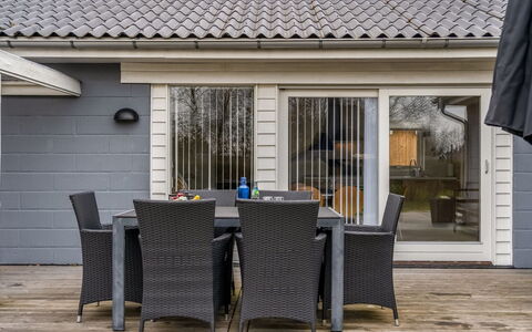 Kerttuli - 800M from the Sea: Wood, Furniture, Outdoor Furniture, Home, Porch, Door, Chair, Floor, Patio, Siding