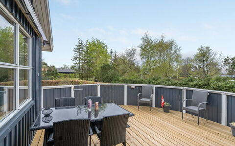 Rafn - 550M from the Sea: Wood, Deck, Porch, Wood Flooring, Hardwood, Shade, Wood Stain, Plank, Chair, Balcony