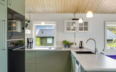 Aashild - 400M from the Sea: Kitchen, Countertop, Interior Design, Kitchen Appliance, Flooring, Cabinetry, Furniture, Wood, Ceiling, Light Fixture