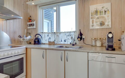 Afrim - 694M from the Sea: Kitchen, Kitchen Appliance, Countertop, Major Appliance, Wood, Interior Design, Cabinetry, Furniture, Room, Lighting