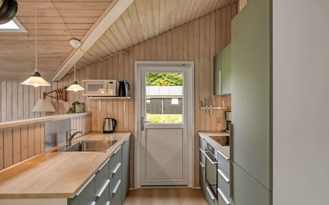 Fliri - 700M from the Sea: Kitchen, Wood, Countertop, Flooring, Interior Design, Ceiling, Kitchen Appliance, Furniture, Floor, Cabinetry