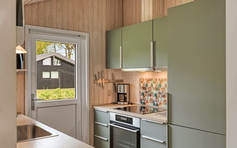 Fliri - 700M from the Sea: Kitchen, Kitchen Appliance, Countertop, Major Appliance, Wood, Interior Design, Flooring, Furniture, Cabinetry, Home Appliance