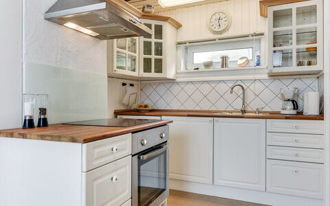 Grazian - 50M from the Sea: Kitchen, Cabinetry, Flooring, Countertop, Interior Design, Wood, Kitchen Appliance, Floor, Drawer, Furniture