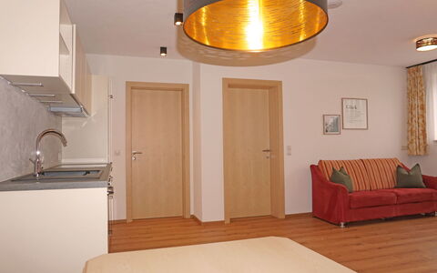 Freiheit-La: Property, Couch, Wood, Comfort, Interior Design, Lighting, Orange, Building, Architecture, Floor