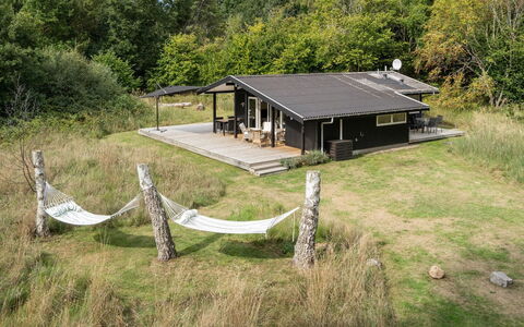 Liselotte - 275M from the Sea: Furniture, Couch, Interior Design, Flooring, Living Room, Floor, Throw Pillow, Room, Pillow