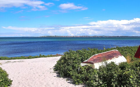 Liselotte - 275M from the Sea: Furniture, Couch, Interior Design, Flooring, Living Room, Floor, Throw Pillow, Room, Pillow