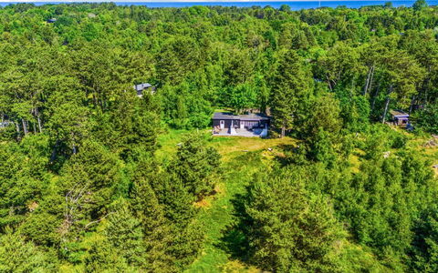 Claudine - 300M from the Sea: Roof, House, Home, Cottage, Siding, Estate, Driveway, Garden Buildings, Yard, Shed