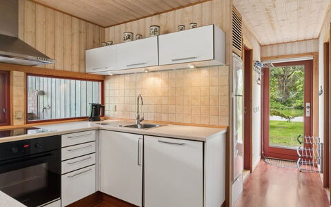 Linda - 600M from the Sea: Kitchen, Countertop, Kitchen Appliance, Flooring, Interior Design, Wood, Major Appliance, Floor, Cabinetry, Ceiling