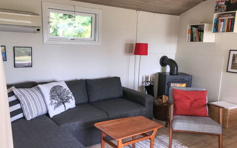 Vojo - 100M from the Sea: Furniture, Couch, Flooring, Wood, Interior Design, Floor, Living Room, Room, Home
