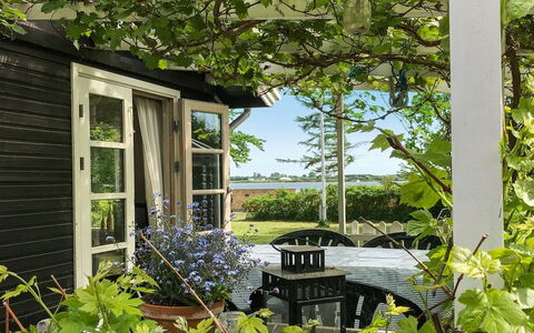 Vojo - 100M from the Sea: Furniture, Outdoor Furniture, Chair, Garden, Shade, Outdoor Table, Flowerpot, Yard, Backyard