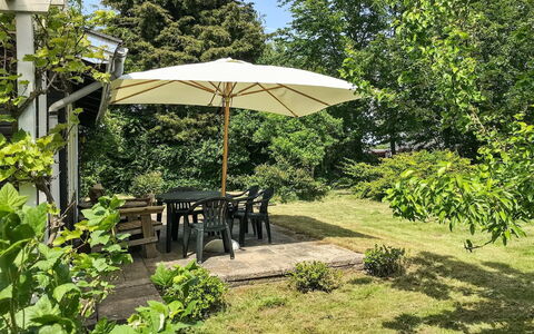 Vojo - 100M from the Sea: Furniture, Shrub, Garden, Umbrella, Chair, Plant Community, Table, Outdoor Table, Outdoor Furniture, Shade