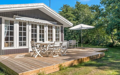 Tineke - 200M from the Sea: Roof, House, Home, Cottage, Door, Siding, Deck, Porch, Plank, Hardwood