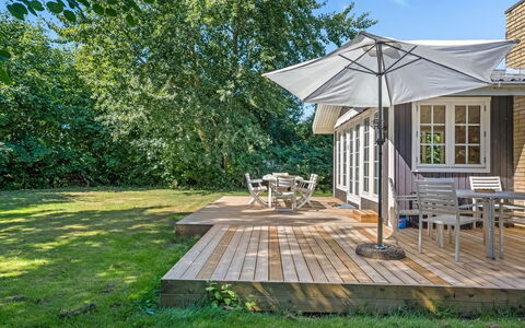 Tineke - 200M from the Sea: Roof, House, Home, Cottage, Door, Siding, Deck, Porch, Plank, Hardwood