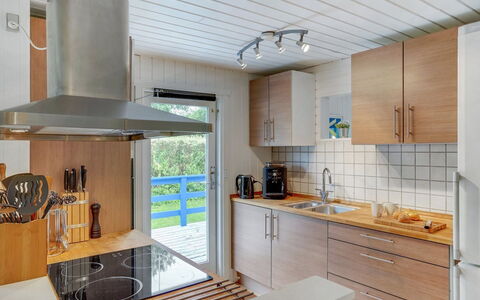 Trixie - 1Km from the Sea: Roof, Home, Door, Cottage, Shade, Siding, Yard, Estate, Backyard