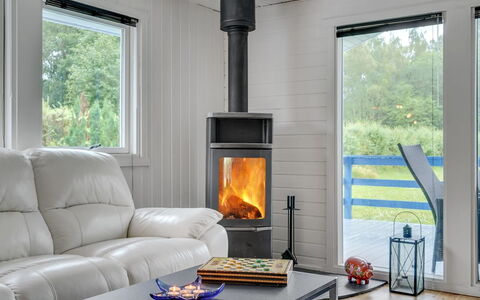 Trixie - 1Km from the Sea: Roof, Home, Door, Cottage, Shade, Siding, Yard, Estate, Backyard