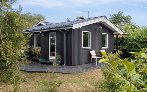 Margit - 10M from the Sea: Roof, House, Home, Cottage, Door, Siding, Estate, Lawn, Yard, Porch
