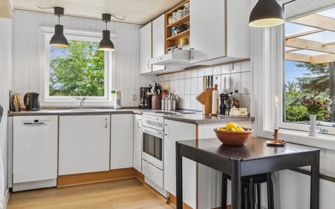 Margit - 10M from the Sea: Kitchen, Kitchen Appliance, Countertop, Major Appliance, Interior Design, Flooring, Wood, Furniture, Home Appliance, Cabinetry