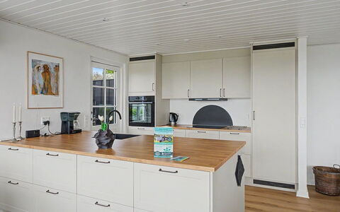 Annalia - 50M from the Sea: Countertop, Cabinetry, Kitchen, Flooring, Kitchen Appliance, Wood, Furniture, Interior Design, Floor, Drawer