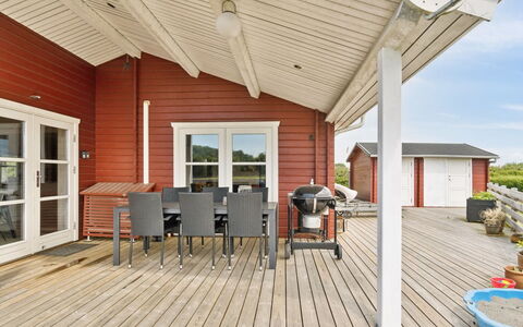 Anneli - 600M from the Sea: Roof, House, Home, Cottage, Door, Siding, Deck, Porch, Plank, Hardwood