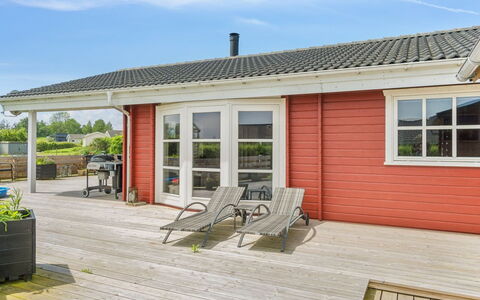 Anneli - 600M from the Sea: Roof, House, Home, Cottage, Door, Siding, Deck, Porch, Plank, Hardwood