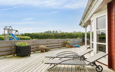 Anneli - 600M from the Sea: Roof, House, Home, Cottage, Door, Siding, Deck, Porch, Plank, Hardwood