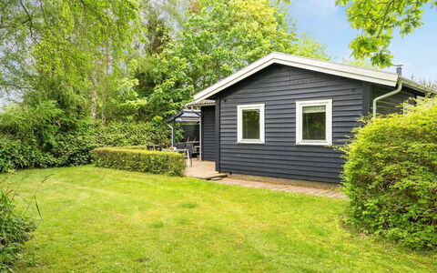 Felisa - 300M from the Sea: House, Shrub, Cottage, Home, Siding, Roof, Garden, Groundcover, Lawn, Garden Buildings