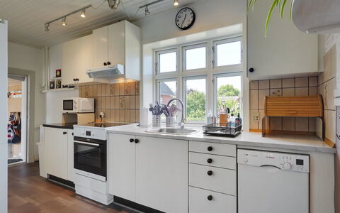 Evje - 250M from the Sea: Kitchen Appliance, Kitchen, Countertop, Major Appliance, Cabinetry, Flooring, Interior Design, Kitchen Stove, Home Appliance, Wood