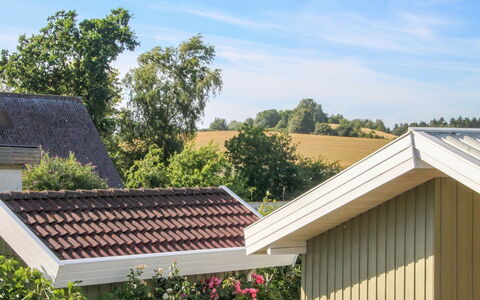 Roel - 500M from the Sea: Roof, Shrub, Siding, Garden, Shade, Yard, Landscaping, Design, Backyard, Garden Buildings