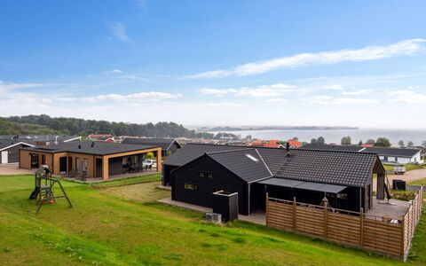Gunborg - 400M from the Sea: Furniture, Interior Design, Flooring, Wood, Floor, Ceiling, Wood Flooring, Chair, Table, Lighting