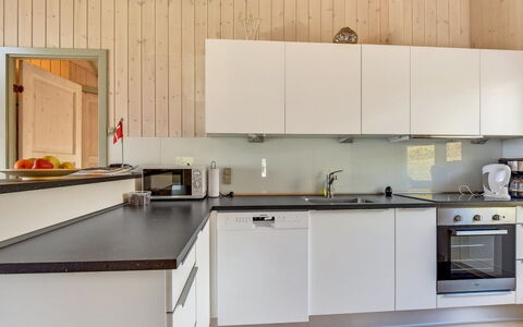 Apsolon - 150M from the Sea: Kitchen, Countertop, Kitchen Appliance, Flooring, Interior Design, Cabinetry, Wood, Furniture, Kitchen Sink, Major Appliance
