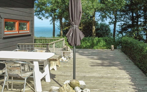 Pirjo - 50M from the Sea: Roof, House, Land Lot, Home, Cottage, Estate, Garden Buildings, Shade, Log Cabin, Landscaping