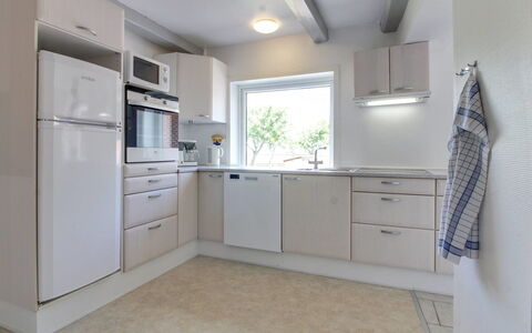 Skarpe: Kitchen, Countertop, Kitchen Appliance, Interior Design, Cabinetry, Flooring, Ceiling, Major Appliance, Floor, Furniture