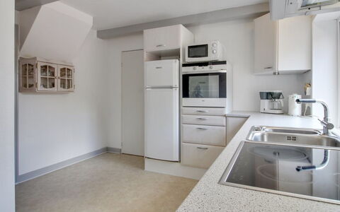 Skarpe: Kitchen, Countertop, Flooring, Kitchen Appliance, Interior Design, Cabinetry, Floor, Major Appliance, Ceiling, Sink