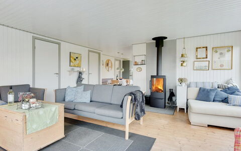 Roar - 500M from the Sea: Flooring, Furniture, Wood, Floor, Interior Design, Couch, Living Room, Room, Home, Ceiling