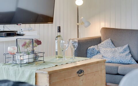 Roar - 500M from the Sea: Furniture, Interior Design, Flooring, Lighting, Room, Living Room, Floor, Table, Home, Couch