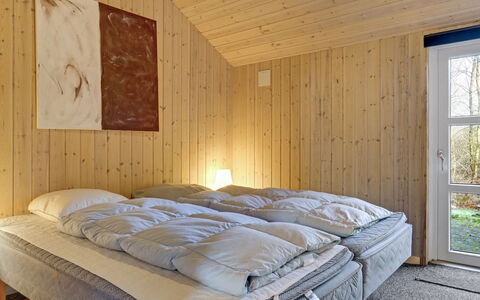 Tyki - 12Km from the Sea: Bedroom, Furniture, Wood, Interior Design, Bed, Floor, Flooring, Bed Sheet, Bedding, Ceiling