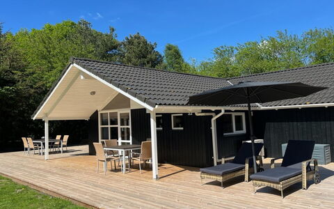 Tyki - 12Km from the Sea: Cottage, Shade, Outdoor Furniture, Porch, Yard, Deck, Outdoor Structure, Garden Buildings, Awning, Siding