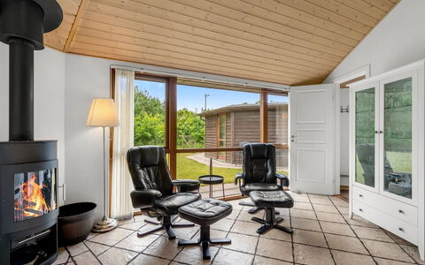 Reiner - 300M to the Fjord: Furniture, Interior Design, Flooring, Floor, Wood, Chair, Ceiling, Living Room, Couch, Wood Flooring