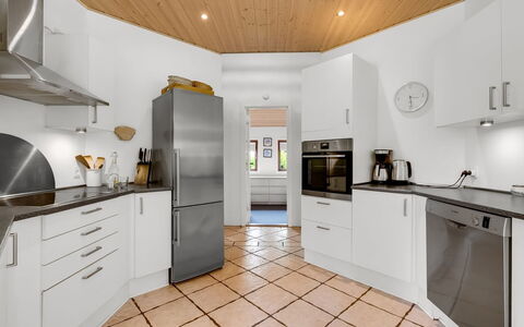 Reiner - 300M to the Fjord: Flooring, Kitchen, Floor, Interior Design, Kitchen Appliance, Wood, Ceiling, Major Appliance, Cabinetry, Countertop