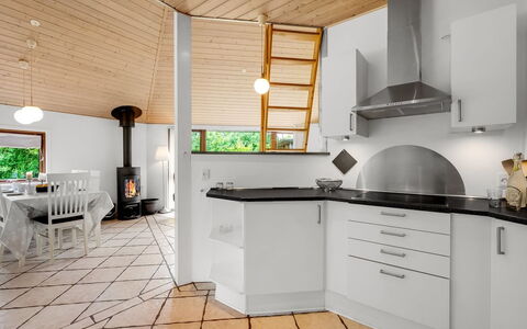Reiner - 300M to the Fjord: Flooring, Interior Design, Kitchen, Ceiling, Floor, Light Fixture, Furniture, Lighting, Countertop, Kitchen Appliance