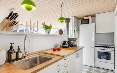 Jorie - 100M from the Sea: Kitchen, Kitchen Appliance, Countertop, Major Appliance, Interior Design, Furniture, Flooring, Cabinetry, Wood, Kitchen Sink