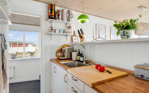 Jorie - 100M from the Sea: Kitchen, Countertop, Interior Design, Flooring, Wood, Kitchen Appliance, Major Appliance, Furniture, Cabinetry, Floor